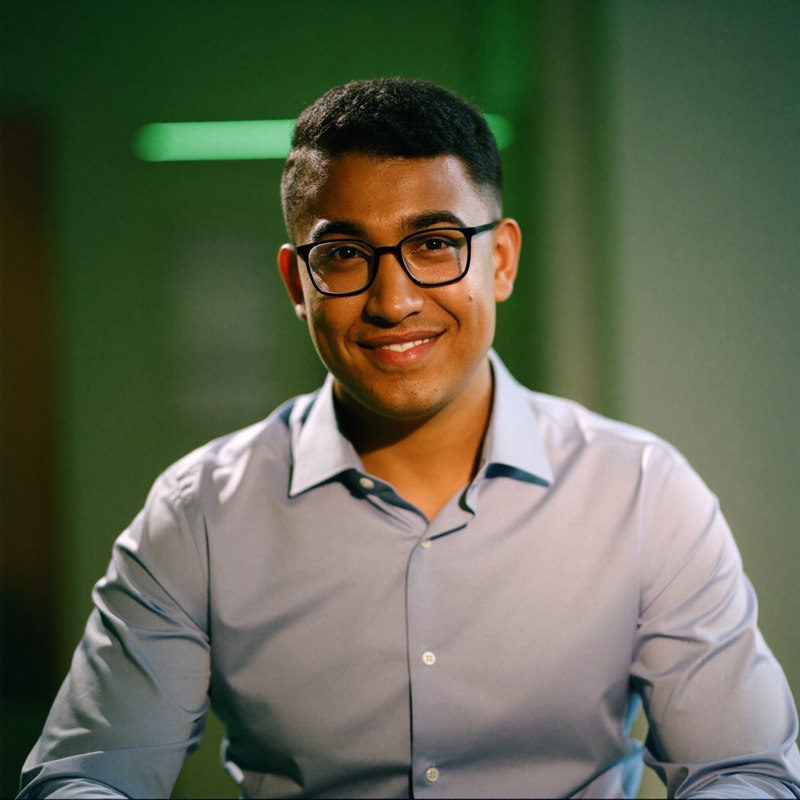 South Asian man with glasses, AI-curious founder